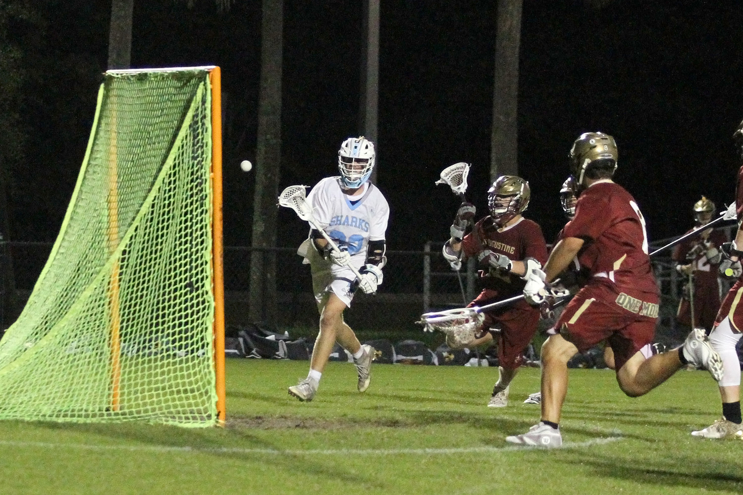 Carter Parlette of Ponte Vedra shoots into an open net as the St. Augustine goalie is caught out of the crease.